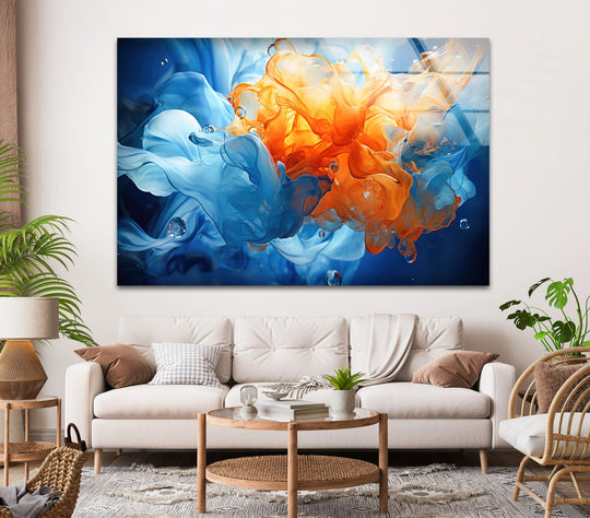 A panoramic orientation showcases abstract blue and orange glass wall art with swirling, organic shapes resembling liquid art for modern home decor.