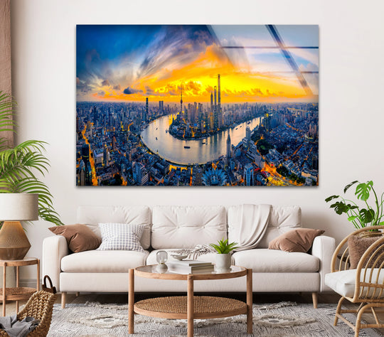 Alternating skyscrapers and radiant colors in the sunset create a captivating visual rhythm in this Shanghai skyline print wall art on glass.