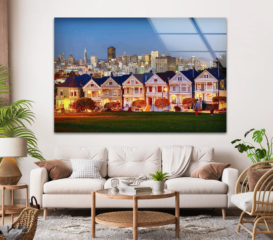 Dramatic color contrast defines this San Francisco glass wall art decor, where vibrant Painted Ladies houses glow against the cool blue cityscape backdrop.