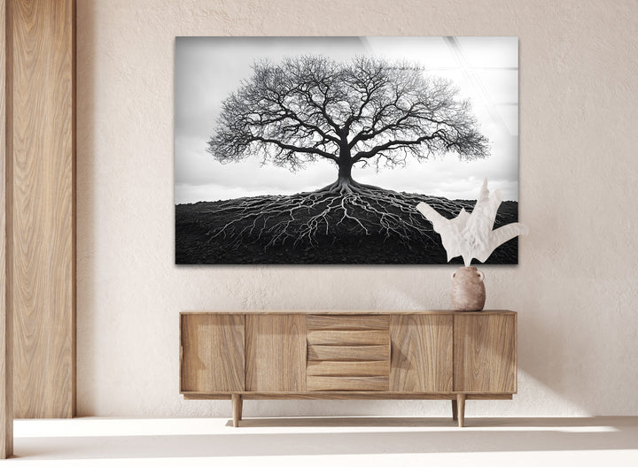 A mesmerizing black and white tree design on glass wall art, symbolizing strength and harmony in nature.
