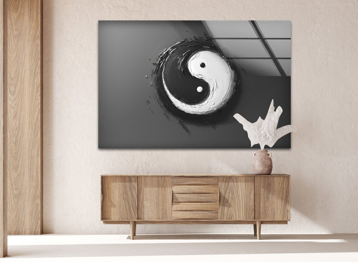 A powerful representation of duality and balance with this black and white yin-yang glass wall art.