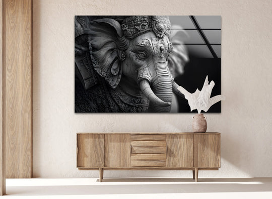 Negative space highlights the Ganesha in Detail black and white glass wall prints, creating a striking contrast and emphasizing the artwork's spiritual essence.