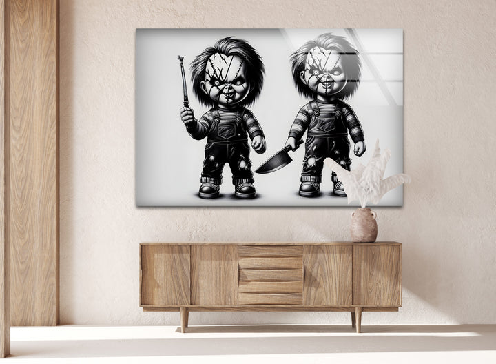 A terrifying black and white framed art piece featuring menacing horror dolls with haunting details.

