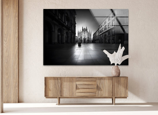 Showcasing the central subject, Duomo di Milano black and white glass wall art complements the home decoration with its breathtaking cityscape and architectural details.