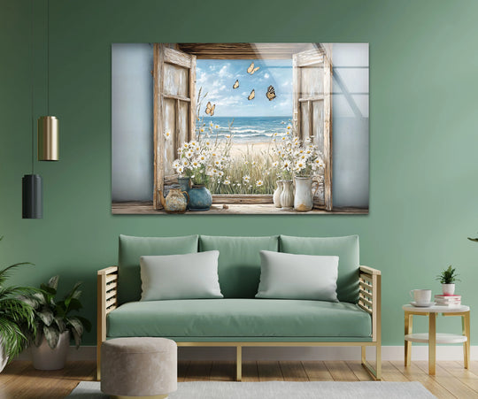Contrasting the green wall, the Butterfly Breeze glass wall art decor features a bright, rustic window framing a vivid blue ocean view with delicate butterflies and white daisies.