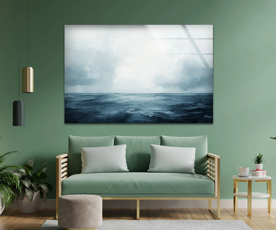 Visual rhythm in the ocean and sky of the minimalist Endless Blue Horizon glass wall art is achieved through repeated cloud formations, making it some of the best glass art.