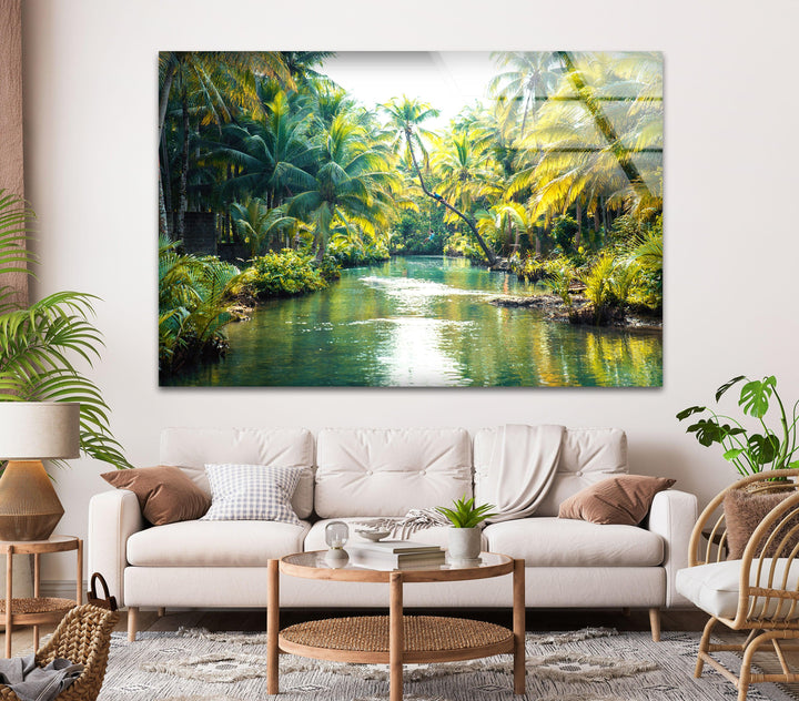 Serene jungle river scene featuring palm trees and crystal-clear waters.
