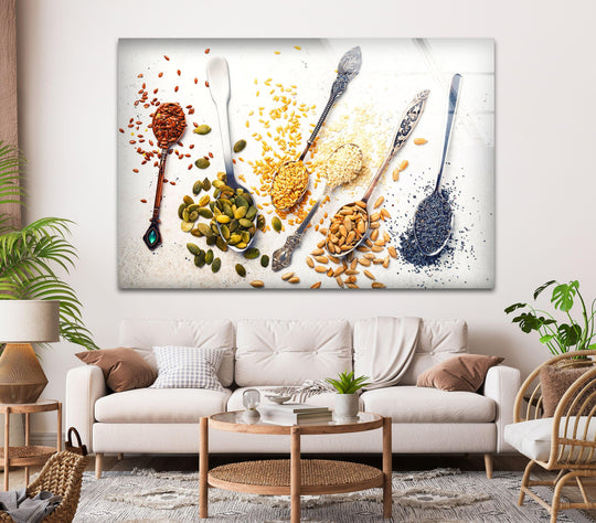 Horizontal glass wall art featuring colorful spices and vintage spoons displayed above a neutral sofa for modern kitchen wall decor.