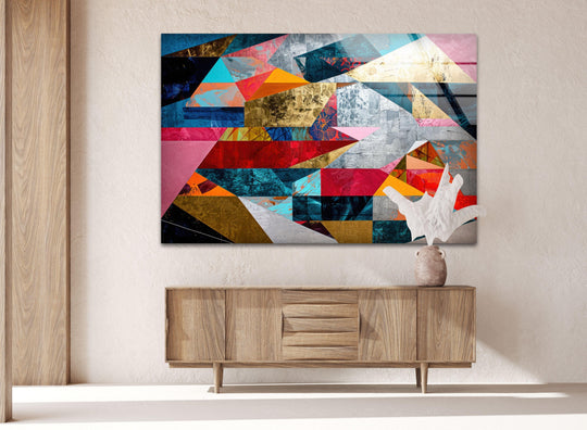 Abstract glass wall art featuring a soft white sculpted form beside vibrant geometric figures, a unique modern wall decor.