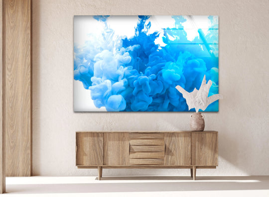 A realistic detail of vibrant blue and white paint swirls rendered on elegant glass wall art decor.