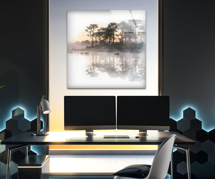Nature paintings for sale depicting a soft sunrise and trees mirrored on a quiet lake.
