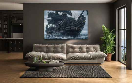 A horizontal rectangular glass wall artwork depicts a large, dark pirate ship sailing on choppy ocean waves under a cloudy sky.