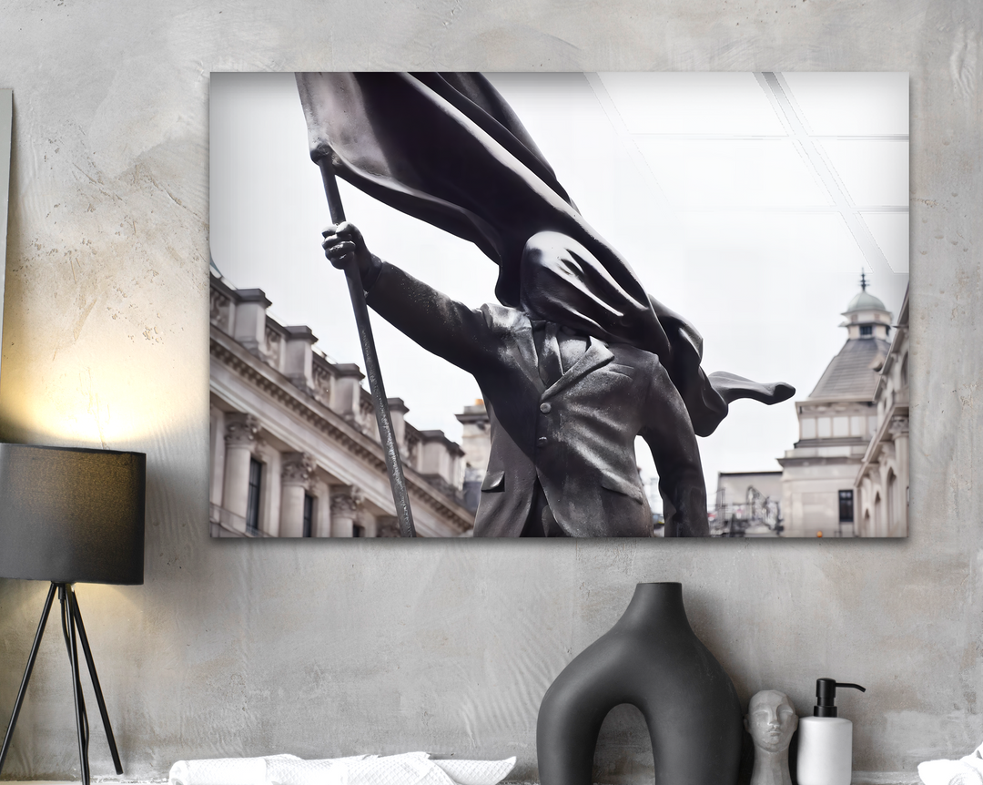 Highlighting impressive depth and distinct layers, this compelling Banksy Flag Bearer glass printing wall art portrays a dark figure gripping a dramatic flag.