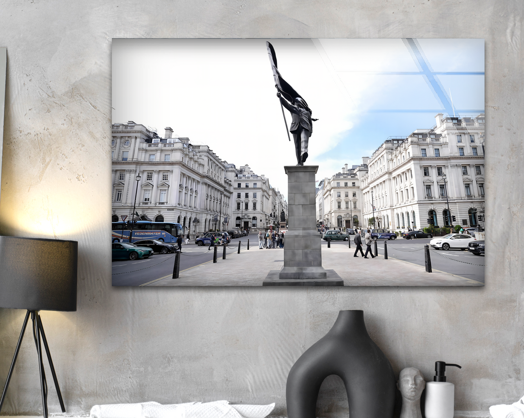The focal point is the dramatic 'Monument of Motion' freedom statue in a bright grand city square, perfect for wall art prints.