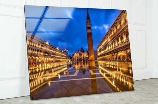 Dominating negative space surrounds the bright St. Mark's Square, reflecting off the Venetian glass wall art, offering a captivating home decor piece.