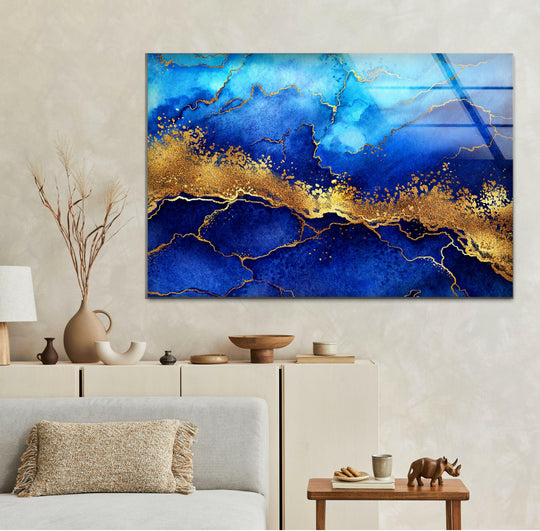Sapphire and gold abstract glass wall art displays deep blue hues and shimmering metallic accents on this modern art from glass.