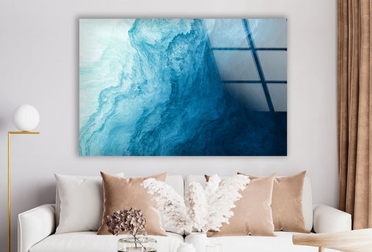 Calm negative space surrounds the fluid ocean blue abstract wall art prints.