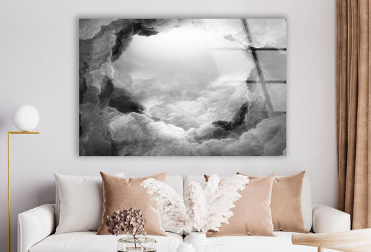 Abstract glass art print featuring a dramatic black and white cloudscape with a bright focal point.