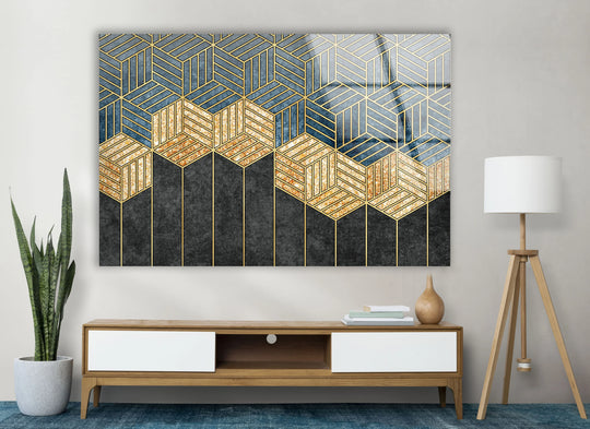 Luxurious gold geometric patterns are etched onto a smooth, glossy glass print with deep navy and textured black finishes.