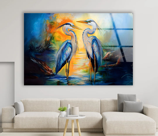 A striking horizontal glass wall art features two herons with angular forms against a geometric sunset, creating unique modern wall decor.