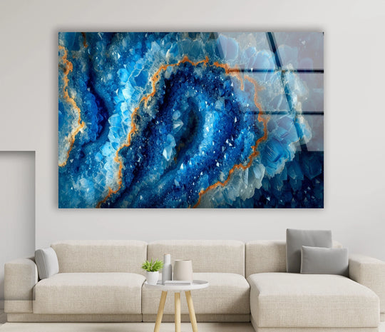 A mesmerizing sapphire blue geode slice glass art piece evokes a sense of tranquil depth and luxurious calm.