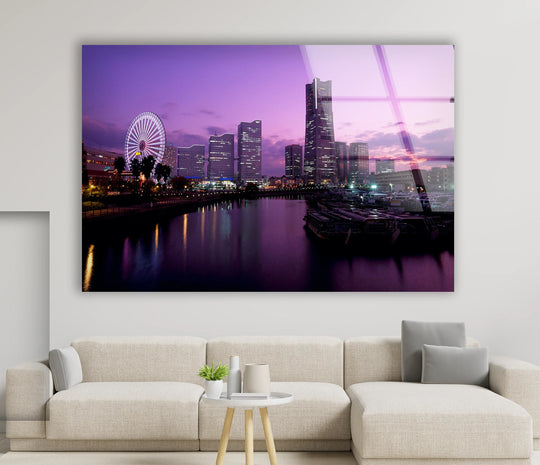 Twilight reflections city skyline is the central subject of this hanging wall art, showcasing its luminous glass surface and vibrant cityscape design.