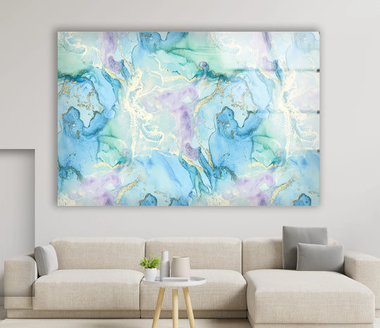 Seamless transitions of sapphire, mint, and lavender hues blend with shimmering gold on this abstract glass art.