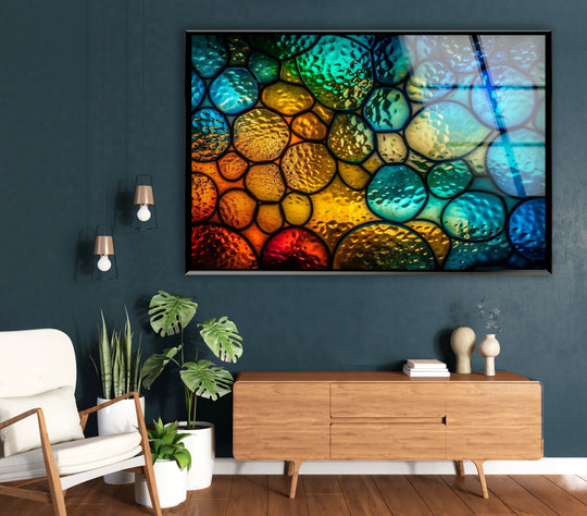 A hyperrealistic glass art print depicts a luminous, abstract mosaic of colorful, bubbled glass circles in emerald, sapphire, gold, and crimson hues.