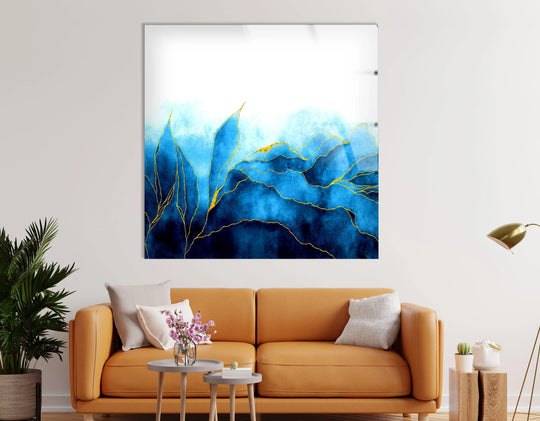 Abstract blue watercolor leaves with gold veins create a textured art from glass.