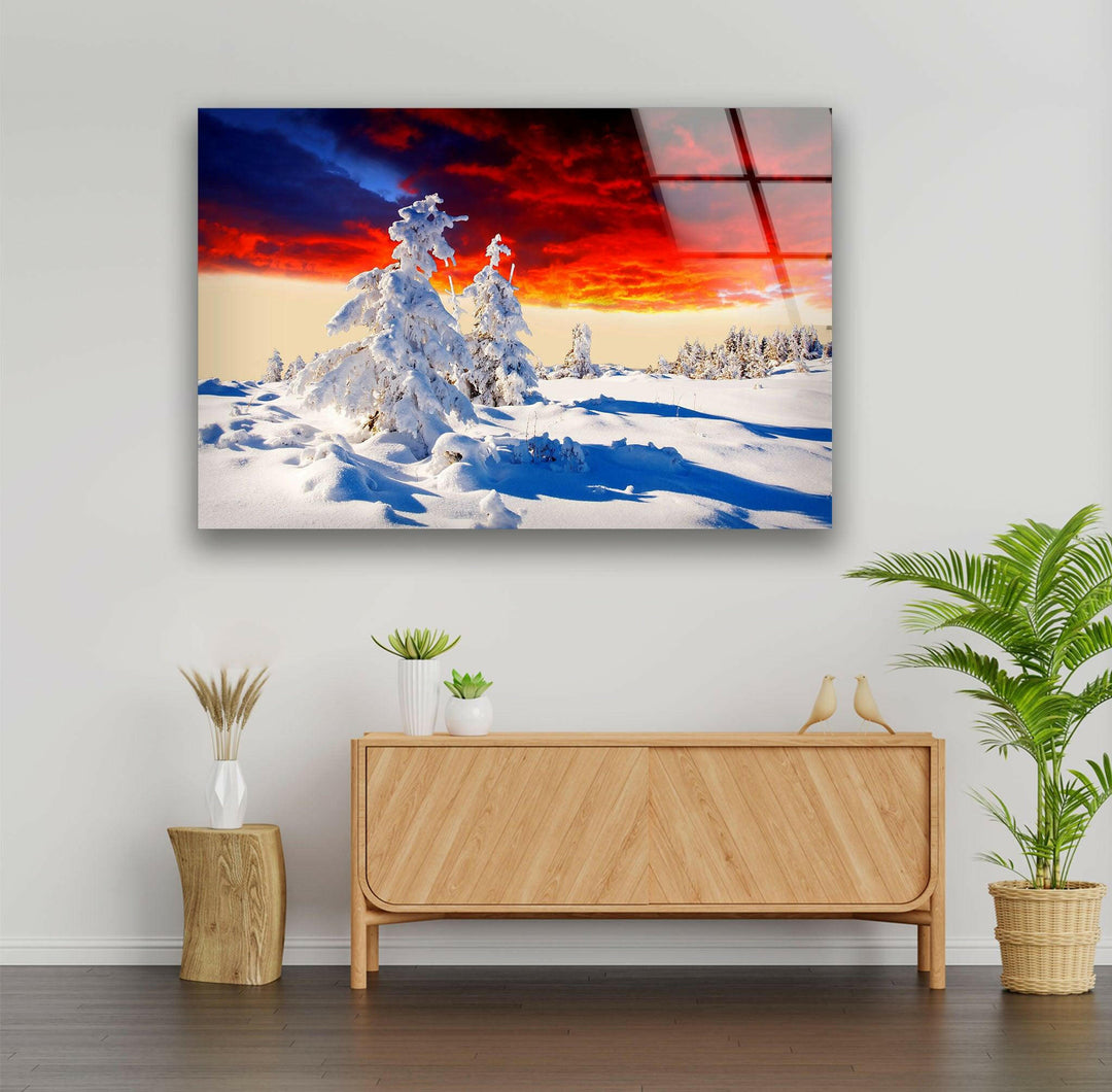 Frozen Serenity: Snow-Covered Landscape Under a Dramatic Sky – A Unique Glass Print
