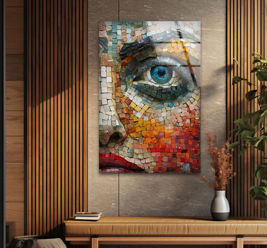 A contemplative mosaic-style female face in this decorative wall art evokes a feeling of thoughtful introspection.