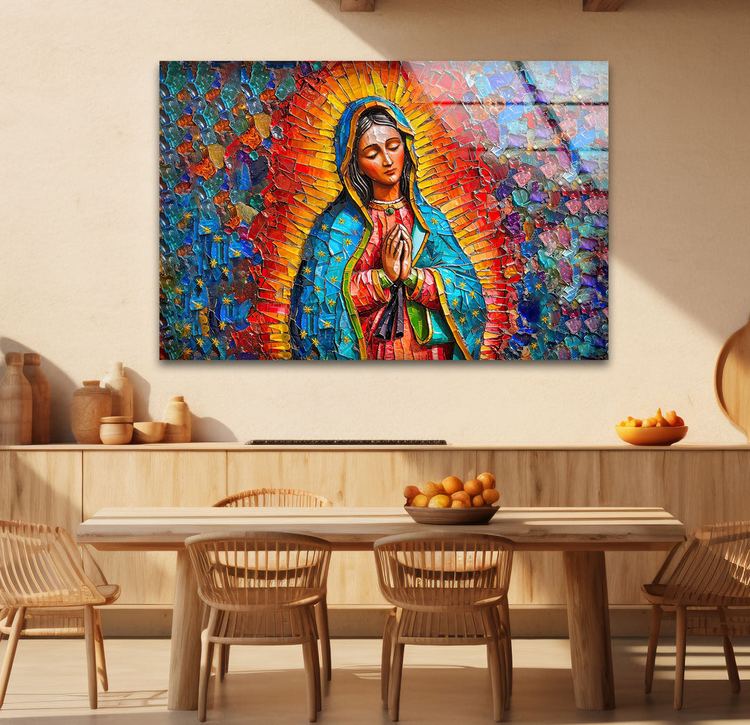 A vibrant mosaic glass wall art depicts the Virgin Mary in prayer with a radiant halo, serving as a captivating home decoration.