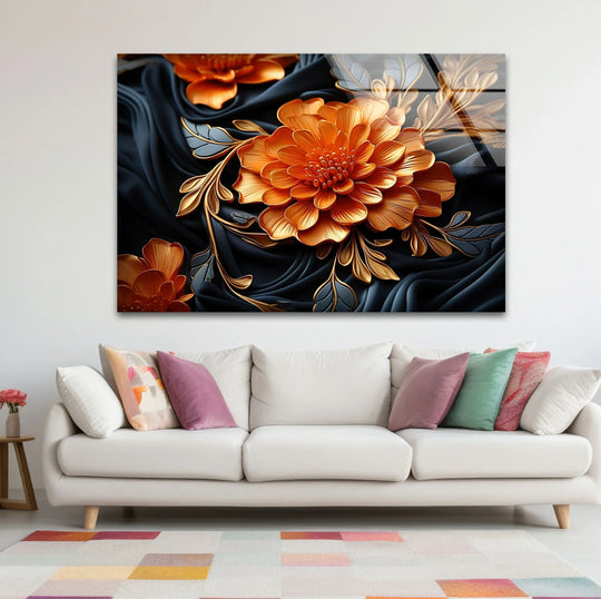Vibrant orange floral details contrast dramatically with the deep navy background of this exquisite glass wall artwork.