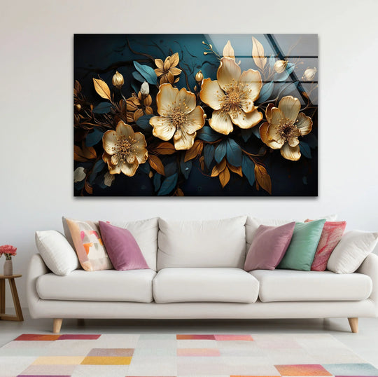 Luminous gold and teal botanical flowers are rendered in realistic detail on this glass wall art decor.