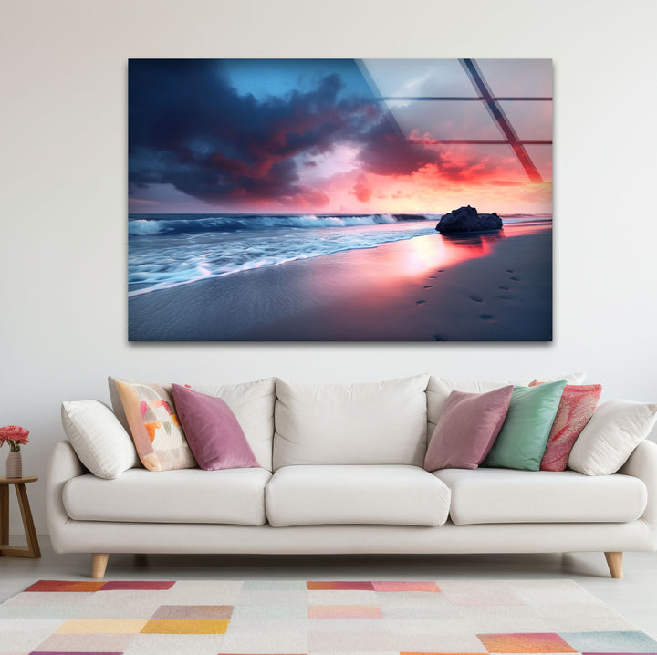 Dramatic Sunset Beach Wall Art – Stormy Sky and Footprints Glass Print for Bold Decor