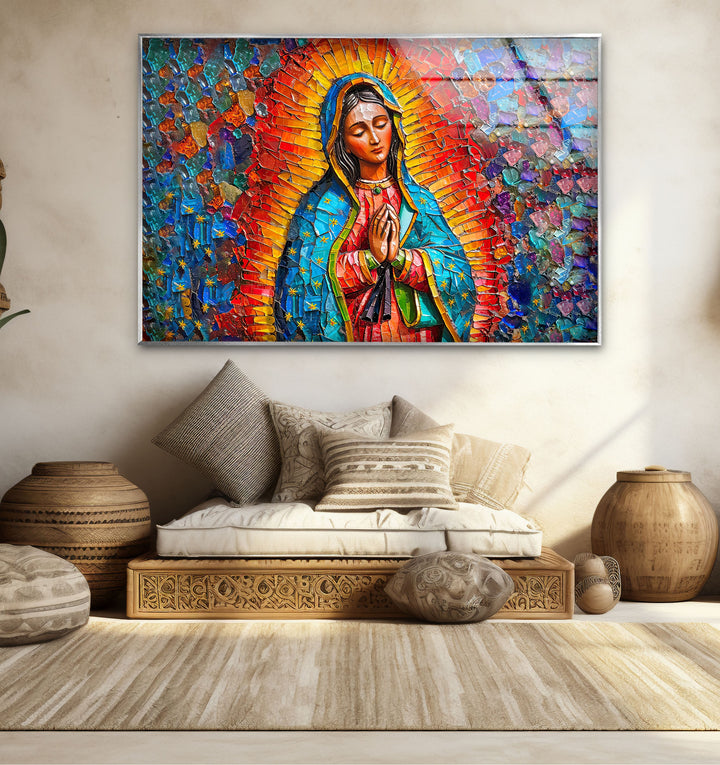 The radiant, mosaic-style background of the religious glass wall art creates a vibrant home decoration with colorful patterns.
