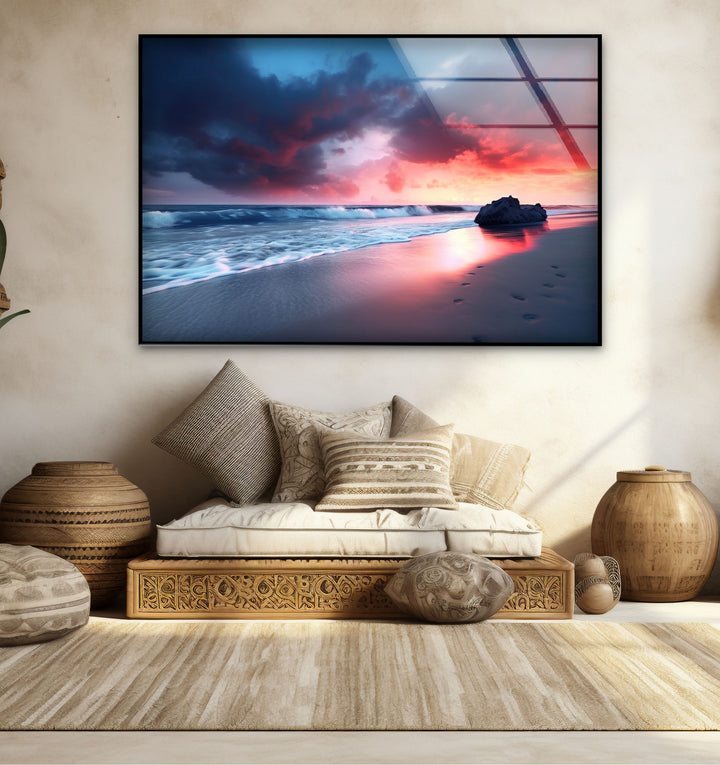 Dramatic Sunset Beach Wall Art – Stormy Sky and Footprints Glass Print for Bold Decor