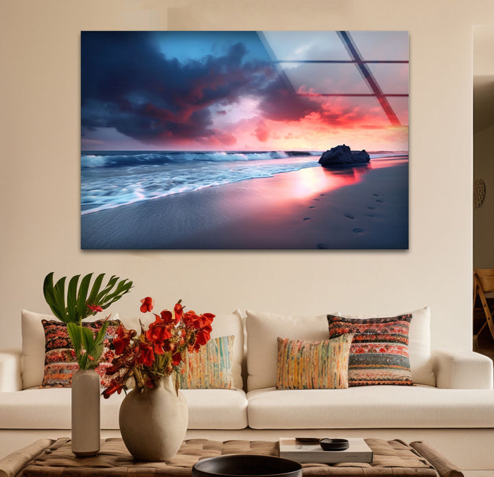 Dramatic Sunset Beach Wall Art – Stormy Sky and Footprints Glass Print for Bold Decor