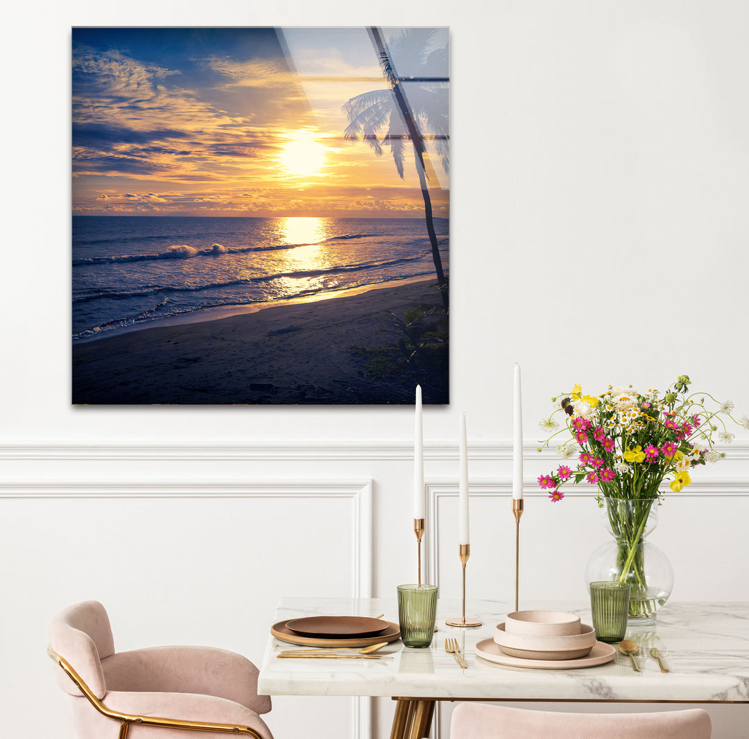 Golden Blue Beach Sunset Wall Art – Coastal Glass Print with Palm Silhouette