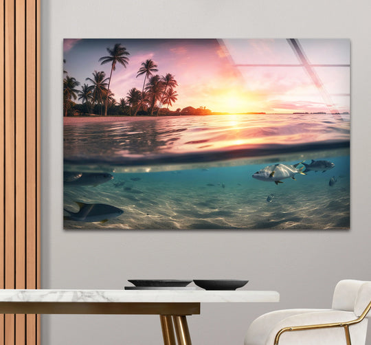 Negative space surrounds the tropical ocean sunset and underwater scene on this glass wall artwork, enhancing its vivid split view of paradise.