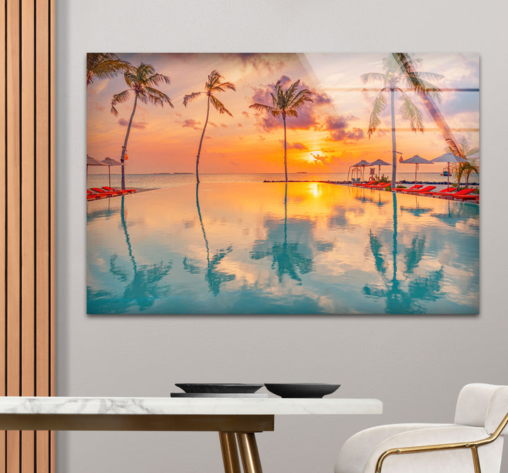 Luxury Tropical Sunset Wall Art – Infinity Pool & Palm Tree Glass Print for Coastal and Resort-Inspired Interiors
