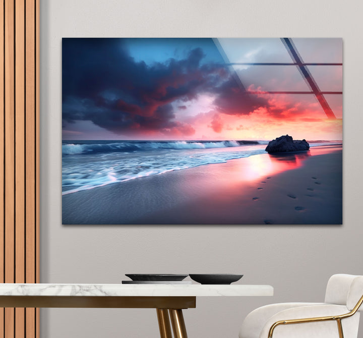 Dramatic Sunset Beach Wall Art – Stormy Sky and Footprints Glass Print for Bold Decor