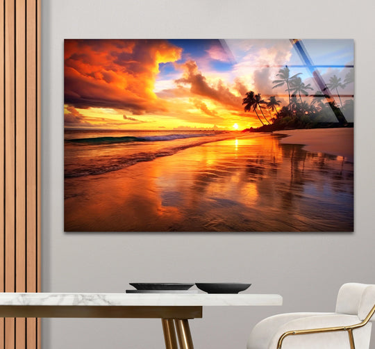 Rectangular glass art painting of a vibrant tropical sunset displays angular cloud formations mirroring sharp reflections on the beach horizon.