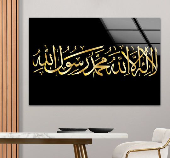 Elegant marble table setting highlights the refined details of a Shahada calligraphy Islamic gold Arabic glass print wall art piece.