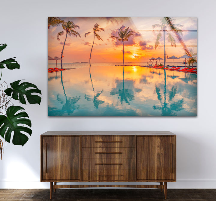 Luxury Tropical Sunset Wall Art – Infinity Pool & Palm Tree Glass Print for Coastal and Resort-Inspired Interiors