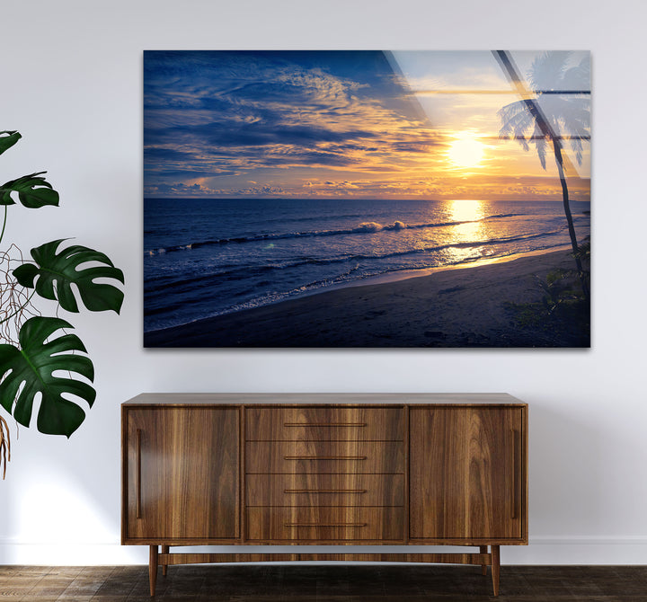 Golden Blue Beach Sunset Wall Art – Coastal Glass Print with Palm Silhouette