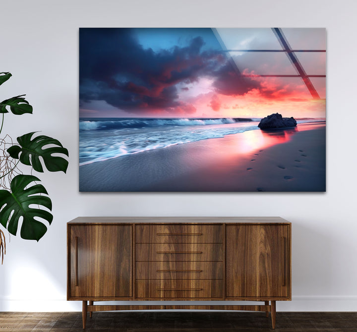 Dramatic Sunset Beach Wall Art – Stormy Sky and Footprints Glass Print for Bold Decor