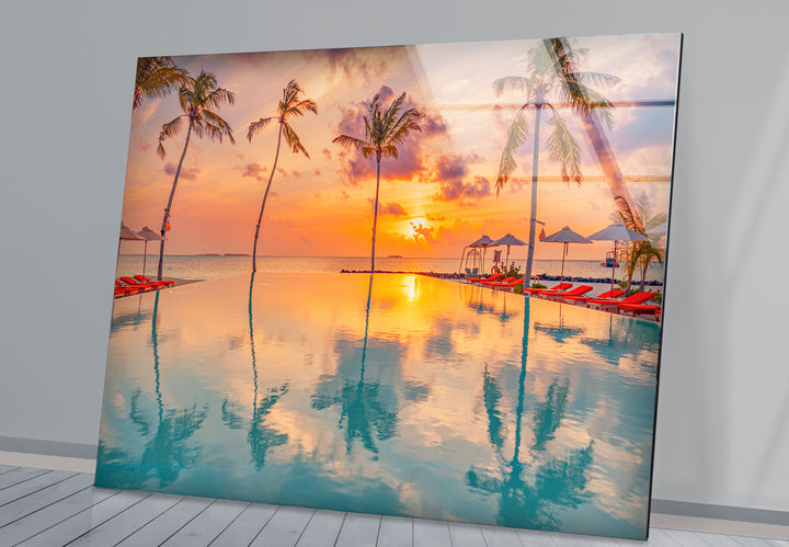 Luxury Tropical Sunset Wall Art – Infinity Pool & Palm Tree Glass Print for Coastal and Resort-Inspired Interiors
