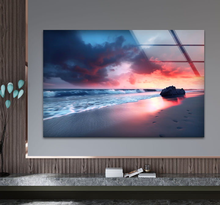 Dramatic Sunset Beach Wall Art – Stormy Sky and Footprints Glass Print for Bold Decor