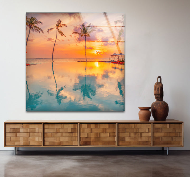 Luxury Tropical Sunset Wall Art – Infinity Pool & Palm Tree Glass Print for Coastal and Resort-Inspired Interiors